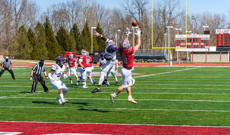 Image shows new synthetic turf football field.